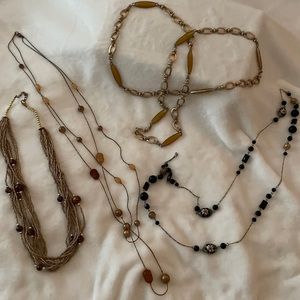 4 long  necklaces all in very nice condition